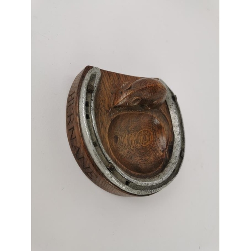 77 - Robert 'Mouseman' Thompson of Kilburn (1876-1955), a carved oak and steel horseshoe pin tray, with s... 