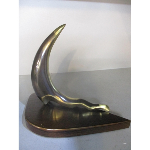 86 - A group of contemporary bronze, brass and resin sculptures to include a patinated brass sculpture of... 