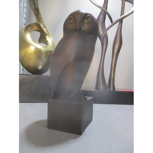 86 - A group of contemporary bronze, brass and resin sculptures to include a patinated brass sculpture of... 