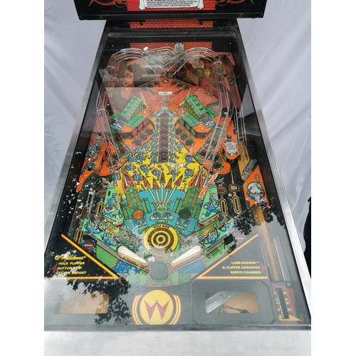 98A - A 1980s retro pinball arcade machine: 'Big Guns' by Williams, model 557, with tall illuminated backb... 