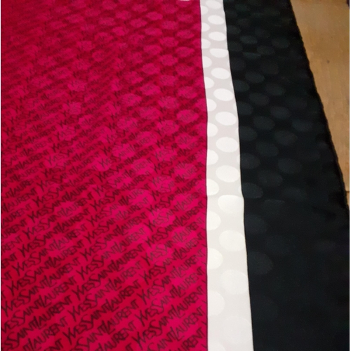 96 - YSL-Three silk scarves, one in red, cream and black with dot pattern throughout and iconic YSL writi... 