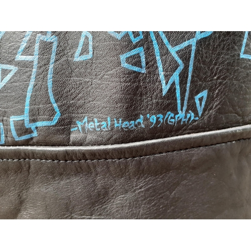 70 - A black leather jacket with hand painted Metallica image to the rear, dated and hand painted 'Metal ... 