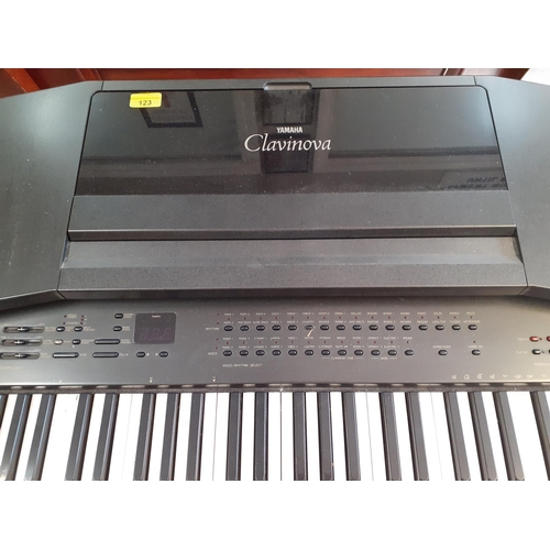 123 - A late 20th Century Yamaha Clarinova electric CVP-20 piano with advanced wave memory together with a... 