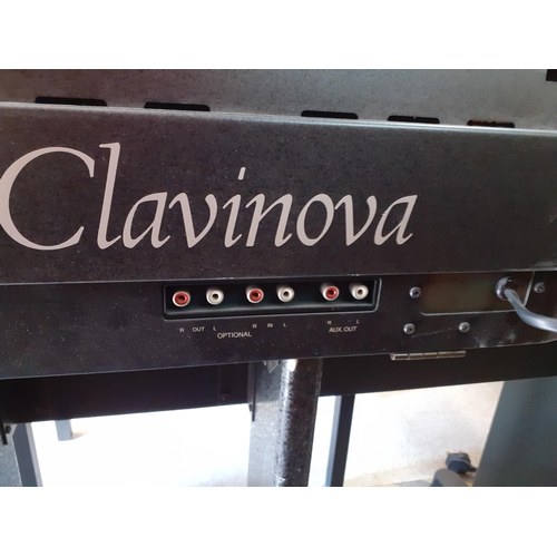 123 - A late 20th Century Yamaha Clarinova electric CVP-20 piano with advanced wave memory together with a... 