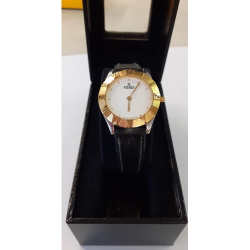 73 - Fendi- A ladies watch with quartz movements, paperwork and original box. Location:RAB