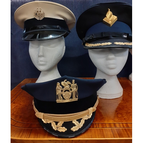 86 - Six Worldwide police caps comprising an RAF police cap made by A.Grantham, size 55, 2 French Gendarm... 