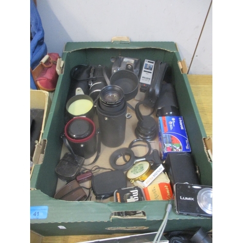 41 - A selection of film and digital cameras, lens, camera bags and accessories to include a Canon E05 30... 