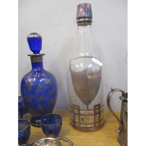 42 - A selection of silver, silver plate and glassware to include a silver cigarette case, a three piece ... 