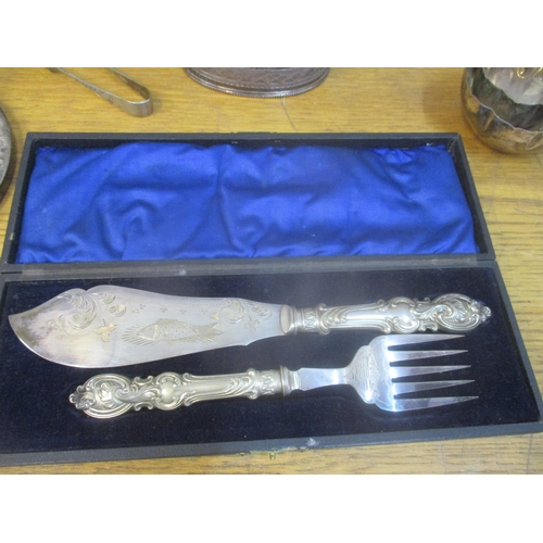 42 - A selection of silver, silver plate and glassware to include a silver cigarette case, a three piece ... 