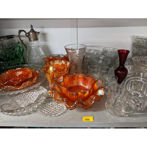 206 - A selection of glassware to include Carnival ware, claret jug, decanter, Whitefriars vase and other ... 