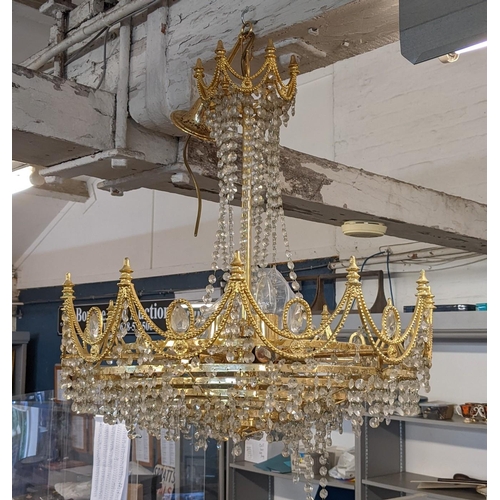 231 - A pair of gilt metal and crystal drop chandelier's
Location: RAB/STAIRS