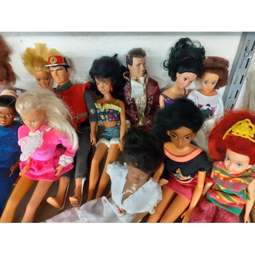 311 - A quantity of Mattel, Hasbro and other dolls, male and female, 1960's - 1990's to include Barbie, Ke... 