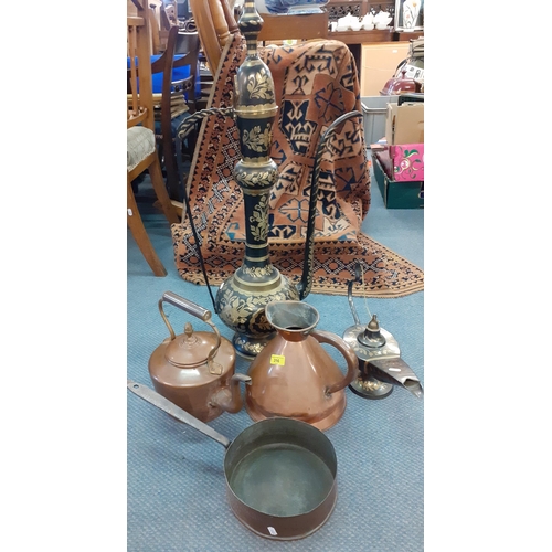 316 - Two large Middle Eastern metal ornaments comprising a coffee pot and an Aladin style pot together wi... 