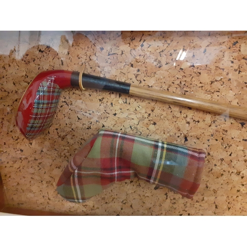 320 - A cased St Andrews hand painted and Carolina tartan Scottish putter, 25cm h x 106cm w
Location: BWR