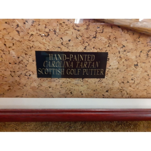 320 - A cased St Andrews hand painted and Carolina tartan Scottish putter, 25cm h x 106cm w
Location: BWR