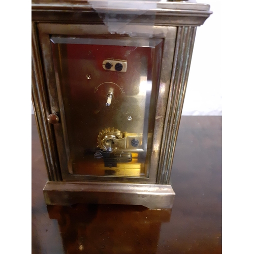 325 - A Mappin & Webb brass cased five window carriage clock with key
Location: RAB