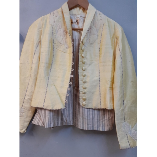 103 - A Sally Hale yellow shot silk ladies outfit comprising two interchangeable strappy tops, a bolero ja... 