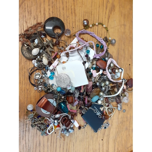 106 - A quantity of modern costume jewellery, mainly bangles and bead necklaces, together with four ladies... 