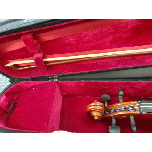 117 - An Intermusic student's violin and bow in fitted case.Location: RAM