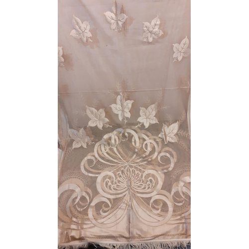 114 - A pair of Art Deco gold coloured and silk mix curtain panels with tasselled fringe, each panel 125cm... 