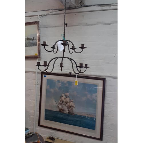 244 - A pair of wrought iron nine armed ceiling candelabras
Location: RWM/RWF UP