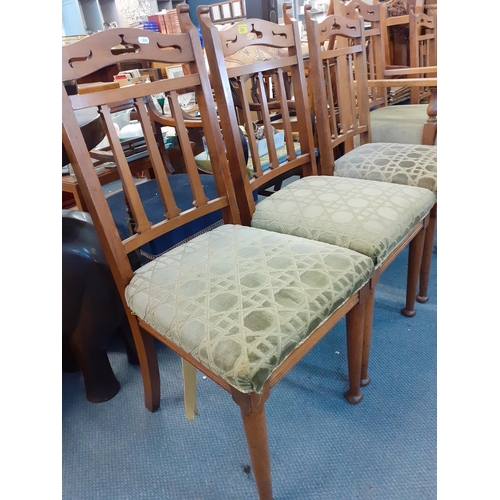 252 - A set of five walnut dining chairs with green upholstered seats and a matching carver chair
A1F