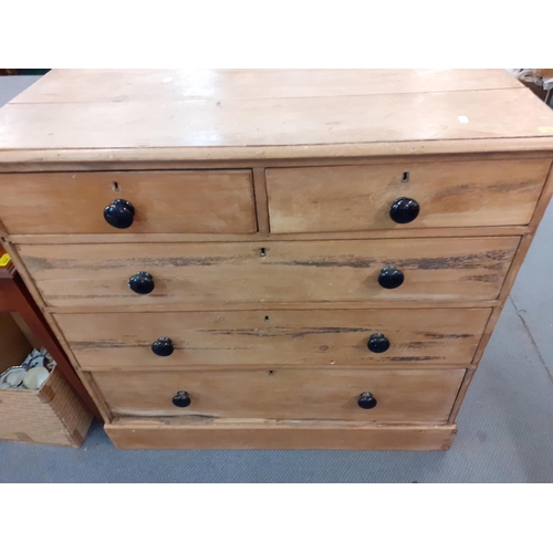 310 - A pine chest of 2 short and 3 long drawers having black bun handles
Location: A2B