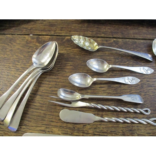 180 - A group of Georgian and later silver flatware to include five Walker & Hall coffee spoons, a small b... 