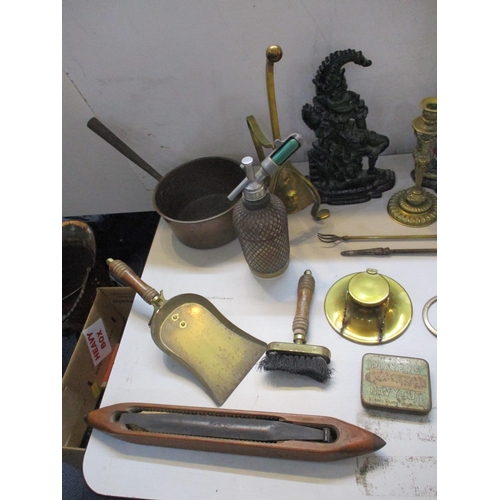 188 - A mixed lot of mainly metalware to include Punch and Judy painted cast metal door stops, brass desk ... 