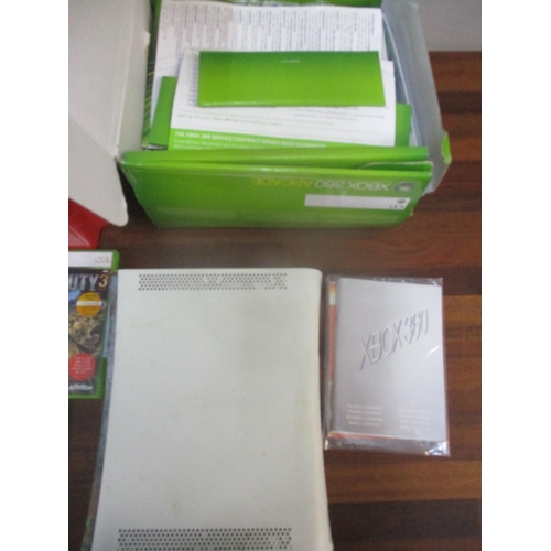 357 - A boxed X-Box 360 Arcade game, along with a quantity of X-Box 360 games including Grand Theft Auto, ... 