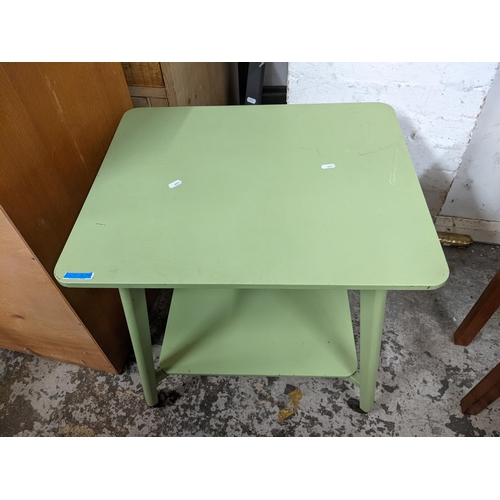 362 - A modern green painted side cabinet having two drawers above two cupboard doors, 101cm h x 43cm w an... 