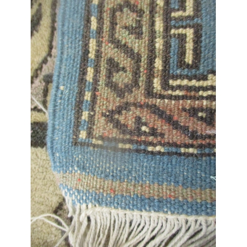 393 - Two hand woven rugs both having blue grounds, geometric designs and tasselled ends
Location: SR