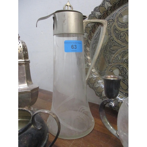 406 - A lot of mixed metalwork to include a secessionist cut glass claret jug with silver plated collar, l... 