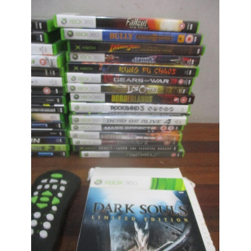 411 - A collection of X-Box 360 computer games to include Dark Souls limited edition, and Top Spin, along ... 