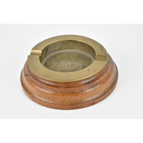 424 - An early 20th century ashtray, made from brass and teak taken from the R.M.S Mauretania 1907-1935, t... 