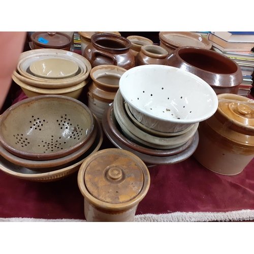 428 - A quantity of early 20th century kitchen stoneware storage jars, sieves and bowls
Location: G