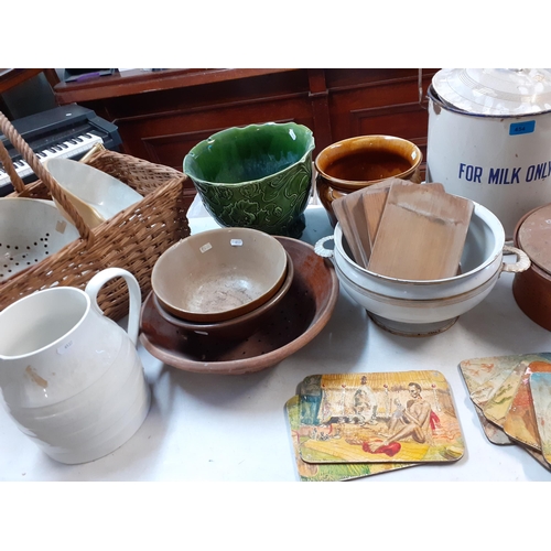 429 - A quantity of Victorian and later kitchenware and planters to include an enamelled milk only pale wi... 