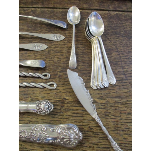 180 - A group of Georgian and later silver flatware to include five Walker & Hall coffee spoons, a small b... 