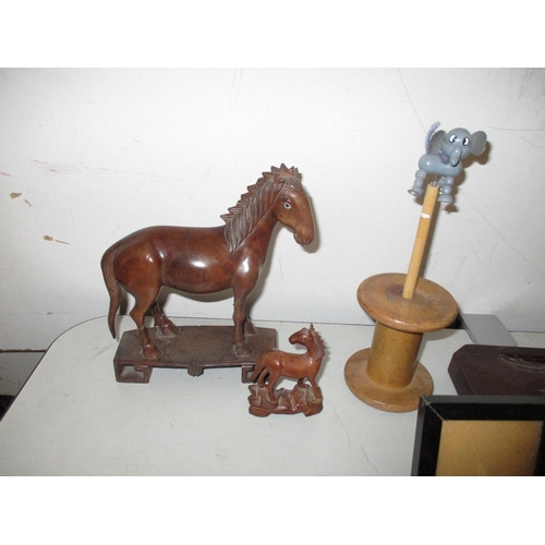 187 - A mixed lot of treen and other wooden items to include a Chinese model of a horse A/F, cigar box, Bu... 