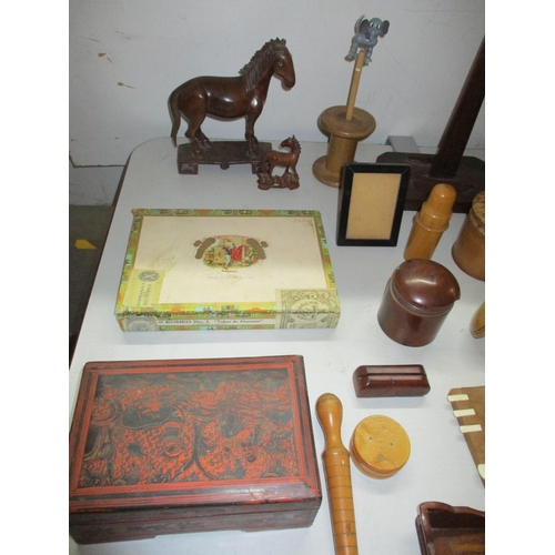 187 - A mixed lot of treen and other wooden items to include a Chinese model of a horse A/F, cigar box, Bu... 