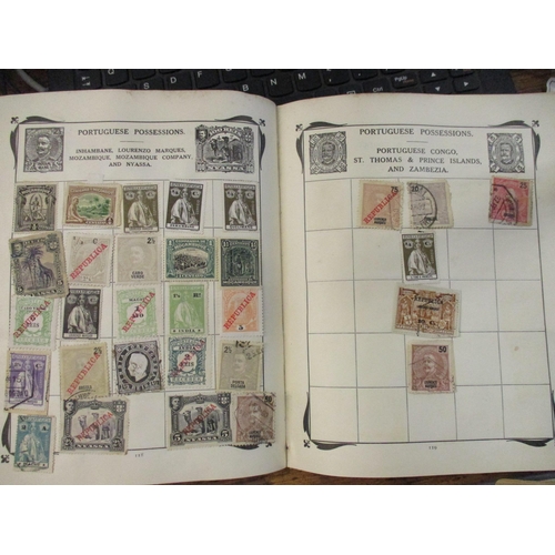 195 - The Strand and Stanley Gibbons stamp albums containing world stamps to include India, Portugal, Brit... 