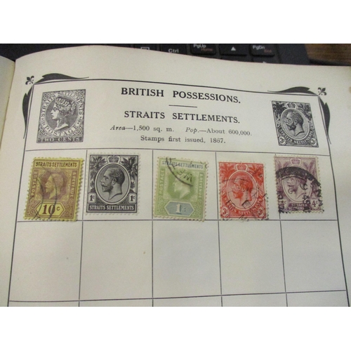 195 - The Strand and Stanley Gibbons stamp albums containing world stamps to include India, Portugal, Brit... 