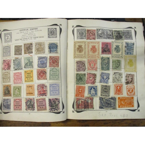 195 - The Strand and Stanley Gibbons stamp albums containing world stamps to include India, Portugal, Brit... 