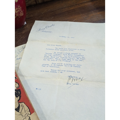 218 - A mixed lot to include a typed letter signed Bing Crosby, dated Nov 26th 1947 with envelope A/F, alo... 