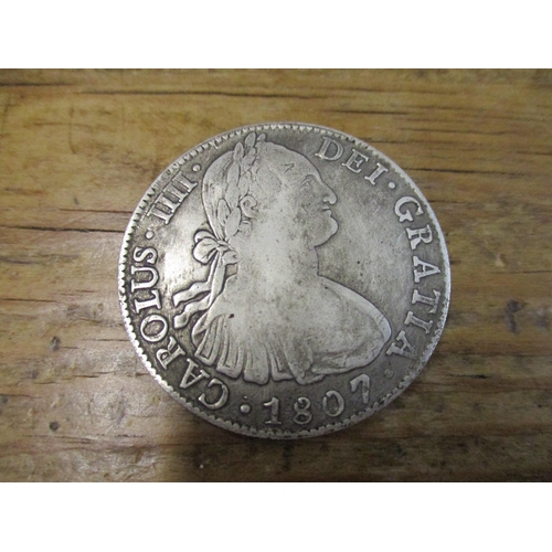 277 - A silver Mexico Spanish Colonial 8-reales Carolus IIII Del Gratia coin dated 1807, good to fine Loca... 