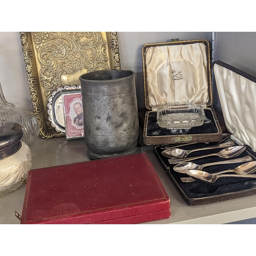 302 - A mixed lot of glassware, silver plate and metalware to include cased silver plate sets of spoons an... 