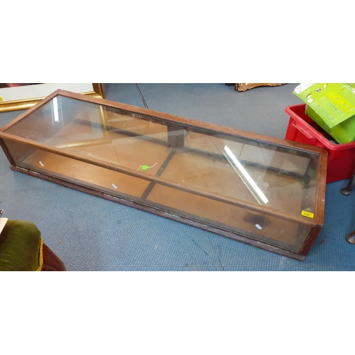 335 - A large oak framed table top shop display cabinet with ring pull and mirrored doors to the back, 20c... 