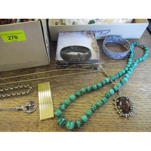 270 - A quantity of costume jewellery to include a silver bracelet, various beaded necklaces, Malecite nec... 