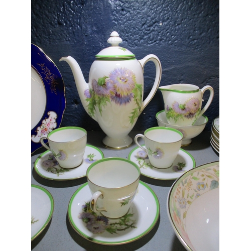 276 - A Royal Doulton Glamis Thistle pattern part coffee set, Royal Doulton Claudia pattern plates and a d... 