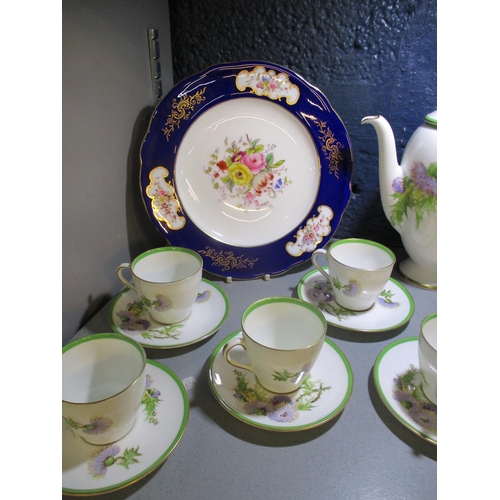 276 - A Royal Doulton Glamis Thistle pattern part coffee set, Royal Doulton Claudia pattern plates and a d... 